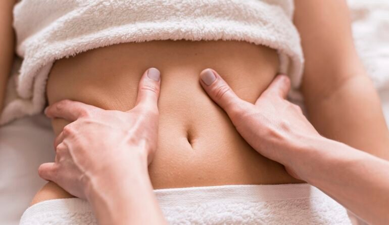 close-up-abdomen-massage-concept close-up-abdomen-massage-concept